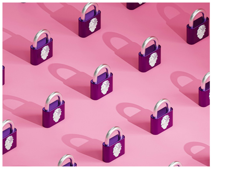 A imagem mostra vários cadeados roxos com arco metálico prateado dispostos em um padrão repetitivo sobre um fundo rosa. Cada cadeado possui o ícone de uma impressão digital branca em destaque, simbolizando identidade digital, segurança e privacidade de dados.